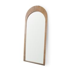 a wooden mirror hanging on the wall