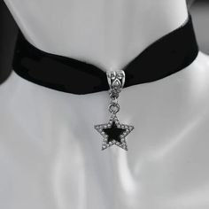 Add some celestial charm to your everyday look with this beautiful handmade Gothic Black Velvet Choker Necklace, adorned with a black star pendant and sparkling rhinestones. Perfect for any occasion, this adjustable choker is a great gift for yourself or a loved one! #celestial #gothic #choker #handmade #giftidea #blackstar #rhinestones #nature #bohemian #valentinesday 💫🌙🖤 #chokernecklace #choker #necklace #jewellery #chokers #jewelry #chokerset #indianjewellery #bridaljewellery #kundanjewel Collar Aesthetic Choker, Celestial Choker, Choker With Pendant, Black Velvet Choker Necklace, Choker Necklace Black, Handmade Choker Necklace, Gothic Choker, Gothic Elegance, Etsy Jewelry Handmade