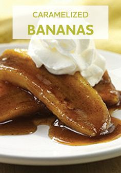 caramelized bananas on a white plate with whipped cream