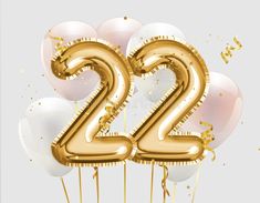 the number twenty two surrounded by balloons and confetti on a gray background royalty illustration