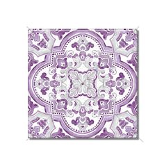 a purple and white tile design