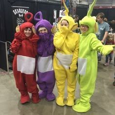 three people in costume standing next to each other