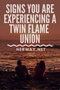 two people sitting on the beach looking out at the ocean and saying, signs you are experiencing a twin flame union