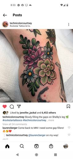 a woman's arm with flowers on it and an instagramt to her