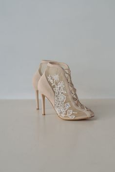 Wedding shoes 'Flower Laces' are handcrafted from soft Italian suede with handmade embroidery on the soft mesh. Romantic boots with a peep toe and lace-up down the front on a pointy heel. They are decorated with lace embroidery with sprigs of blooming flowers. Thanks to the adjustable lacing, this pair will fit any width. Inside there is a soft memory foam insole, which gives a feeling of additional comfort when walking. Tunit outsole is made of a mixture of leather chips and rubber, it's more w Beige Fitted Closed Toe Wedding Shoes, White Embroidered Round Toe Heels, Floral Embroidered High Heel Wedding Heels, Embroidered High Heel Wedding Shoes, Wedding Heels With Floral Embroidery And Round Toe, Wedding Heels With Pearl Embroidery, Floral Embroidered High Heels For Wedding, Pearl Embroidered Heels For Wedding, Spring Wedding Heels With Floral Embroidery