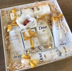 Dove female beauty products beautifully wrapped in white and gold  for Mother’s Day. Hampers For Mothers Day, Mother’s Day Gift Hampers, Bridal Gift Hamper Basket Ideas, Shadi Gift Baskets, Dove Basket Ideas, Dove Gift Basket Ideas, Shaadi Gift Basket, Gift Wrapping For Wedding, Creative Hampers Ideas