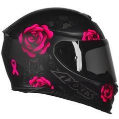 a motorcycle helmet with pink roses on it