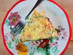 a piece of quiche on a plate with a fork and flowered paper napkin