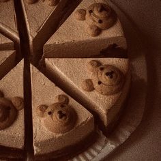 a cake with teddy bears cut into slices