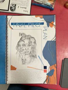 a drawing book with an image of a woman's face on it