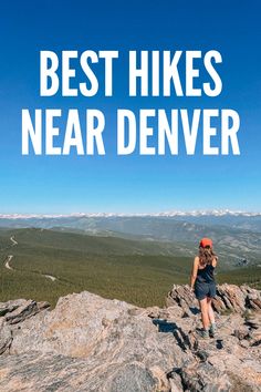 a woman hiking on top of a mountain with the words best hikes near denver