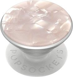 an image of a white knob with pink mother of pearl in the center and words popsock on it