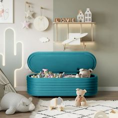 a child's room with toys and decor on the floor, including a toy chest