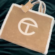 Telfar X Ugg Medium Shopper Bag. Brand New Never Worn. Tiktok’d The Bag And Placed It Back In The Box. Make Me An Offer. I Don’t Bite! Telfar X Ugg, Telfar Bags, Ugg Bag, Trendy Purses, Pretty House, Bag Brand, Shopper Bag, Shopping Tote, Medium Bags