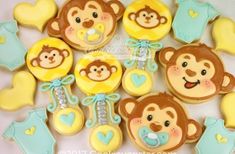 monkey cookies decorated with fondant and icing for a baby shower or birthday party