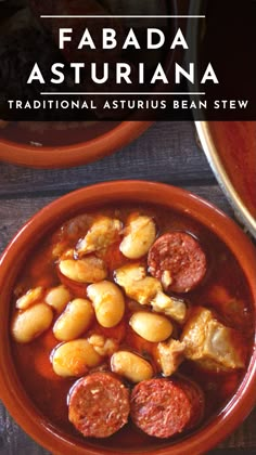 a bowl filled with sausage and potatoes next to another bowl full of stew on top of a wooden table