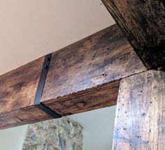 a close up of a wooden beam in a room