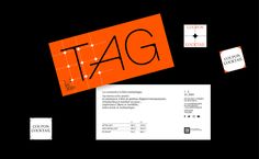 an orange tag with the word tag on it and some stickers around it in black