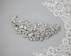 An arched-style wedding headpiece clip set in silver plate with maximalist flair! This clip is gorgeous and is styled with many different layers of sparkle. Crystal-covered leaves, crystal beads, round, oval, and pear-cut stones, and scrolls covered with more stones! It could be worn as a side or back piece. This brida Glamorous Bridal Hair, Back Piece, Wedding Headpiece