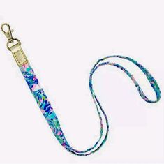 New With Tag Lilly Pulitzer Lanyard In Cabana Cocktail. Lobster Claw. Light Blue. Polyester. Gold-Tone Metallic Hardware. Preppy Lanyard, Seashell Bracelet, Keychain Fob, Card Case Wallet, Wristlet Clutch, Change Purse, Card Holder Wallet, Key Card Holder, Card Holders