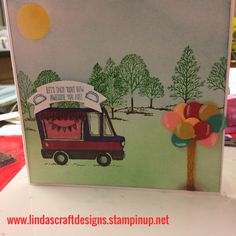 a card with an image of a food truck and balloons on the front that says, let go out of the oven