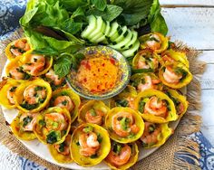 a platter filled with shrimp and vegetables