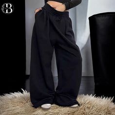 Wide Leg Sweatpants for Women: High Waist Baggy Fit, Casual Loungewear & Street Style
Discover the ultimate blend of comfort and style with our wide-leg sweatpants for women. Designed with a high waist and a relaxed, baggy fit, these pants are perfect for those who love to combine fashion with ease. Whether you're lounging at home or stepping out for a casual day, these versatile pants are an ideal choice. Cheap Baggy Ankle-length Sweatpants, Baggy High Waist Sweatpants, Cheap Baggy Joggers For Spring, Cheap Wide Leg Joggers With Pockets, Cheap Baggy Straight-leg Sweatpants, Cheap Baggy Spring Joggers, Cheap Wide Leg Sweatpants For Leisure, Wide Leg Sweatpants Nordstrom, Cheap Wide Leg Sweatpants For Lounging