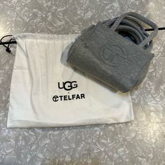 Telfar And Ugg Collab. It Is There Mini Grocery Bag In The Jersey Type Material. They Are Super Small, But It Was Loved And Now It Needs A New Home To Be Loved More At. The Material Will Start To Do. What Like Sweatpants Do In The Inner Thighs. Just Be Careful With The Material And Take Care Of It. Telfar X Ugg, Telfar Handbags, Inner Thigh, To Be Loved, Be Careful, Grocery Bag, And Now, Take Care, Mini Bag