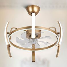 a ceiling fan with a light on top of it