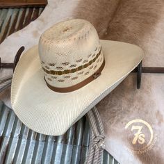 Twister ivory bangora vented straw hat. Ivory and tan with a caramel hat band. Cool Hand Luke crown shape. Medium to wide brim crease. Quality mesh fabric interior band. Designed for wear by women or men, fashion or function. Rugged and durable. 5 1/2" crown and 4 1/2" brim. Cool Hand Luke, Rodeo Life, Western Life, Hat Band, Cowboy Hat, Wide Brimmed, Straw Hat, Mesh Fabric, Men Fashion