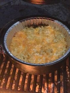 a pie sitting on top of an open grill