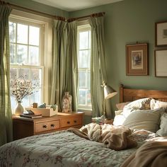 a bed sitting in a bedroom next to two windows with green drapes on them