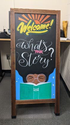 a chalkboard sign with the words welcome to what's your story written on it