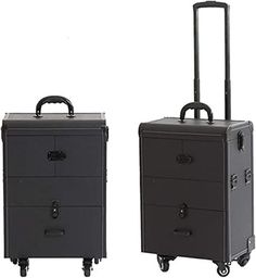 two black suitcases sitting next to each other