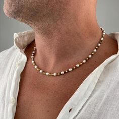 Geniune Freshwater Pearl Gold Necklace is elegance on your neck. Discover the privilege that perfect mens necklaces for modern people will create in your style.  Features of the necklace: - Pearl size: 6mm freshwater pearl - Pearl color: White - Luster: High - Beads quality: AAA + - Diamond Cut Rhodium Gold Bead - Hematite - Clasps: Stainless steel gold lobster clasp  - Necklace size: 18"(46 cm), 19"(48 cm), 20"(51 cm), 21"(53 cm), 22"(56 cm) and 23"(58 cm)  You may choose extra chain extension Classic Gold Necklace With Gemstone Beads, Men’s Pearl Necklace, Gold Necklace For Men, Pearl Jewelry Sets, Gold Pearl Necklace, Real Pearls, Freshwater Pearl Necklaces, Pearl Color, Pearl Size