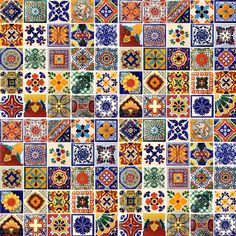 an assortment of colorful tile designs in different colors and patterns, all on one wall