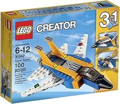 a box with a lego creator set in it's front and the contents inside