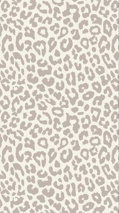 an animal print wallpaper in grey and white