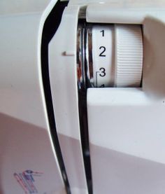 a close up view of the inside of a sewing machine