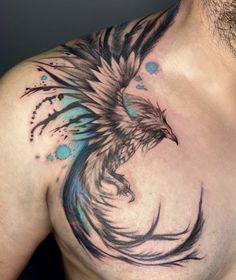 a man with a tattoo on his chest has an eagle and watercolor splashes