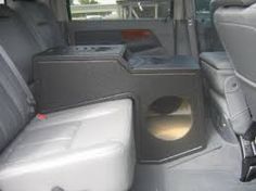 the interior of a vehicle with two speakers