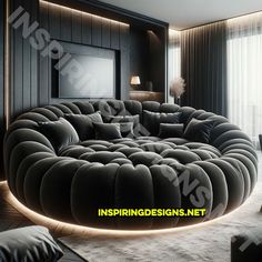 a large round couch in the middle of a living room