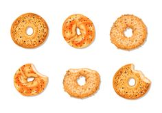 six bagels in different shapes and sizes on a white background top view, flat lay