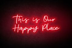 a neon sign that says, this is our happy place