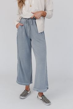 comfy and cozy all in one! our Cropped length leg lounge pant with drawstring waist and pockets will be your closet fave for pairing with graphic tees for school pick up or running errands! Comfy mineral washed sweatpant fabric Relaxed and loose wide leg silhouette High rise elastic drawstring waist Cute piping detail down the sides Curved hem with continued piping along the bottom *This colorway is the cropped length version, we also have a full length and petite length to fit every height! *Du Modest Pants, Teacher Fits, Hawaii Summer, Church Fits, Wardrobe Makeover, Fall Capsule Wardrobe, Wide Leg Cropped Pants, Comfy Pants, Wide Leg Pant