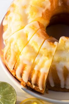 a bundt cake with lemons on the side