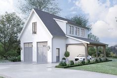 a white car is parked in front of a two - story house with an attached garage