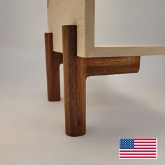 a wooden chair with an american flag sticker on it