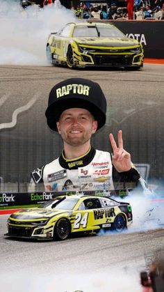 a man giving the peace sign while standing in front of a race car