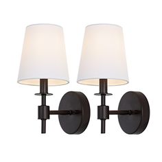 Experience a magical shift in your home ambiance with our Black Iron Sconces. These elegant black sconces are built with robust iron, guaranteeing their durability and strength. Sophistication and function collides in this classic design, infusing any space with a warm, ambient glow. Whether you're wanting to illuminate a hallway, add an atmospheric lighting touch to the living room, or bring some old world charm to your dining area, these sconces are your ideal solution. Besides, the black hue Farmhouse Sconces Bedroom, Black Sconces Bedroom, Black Sconces Living Room, Modern Wall Sconces Bedroom, Living Room Sconces, Fireplace Sconces, Bedroom Sconces, Farmhouse Sconces, Sconces Black